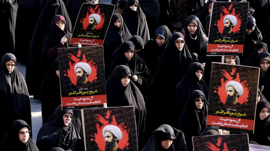 Iranian protesters hold pictures of prominent Shi'ite cleric Sheikh Nimr al-Nimr during a demonstration against the execution of al-Nimr in Saudi Arabia, at Imam Hussein square in Tehran January 4, 2016.  REUTERS/Raheb Homavandi/TIMA  ATTENTION EDITORS - THIS IMAGE WAS PROVIDED BY A THIRD PARTY. FOR EDITORIAL USE ONLY.  - RTX20Z33