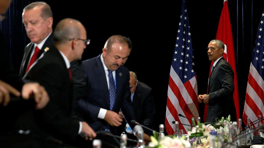 U.S. President Barack Obama (R) tracks down Turkey's President Tayyip Erdogan (2nd L) for a brief private conversation after they gave remarks to reporters following their bilateral meeting alongside the G20 Summit in Hangzhou, China September 4, 2016. REUTERS/Jonathan Ernst     TPX IMAGES OF THE DAY      - RTX2O2NQ