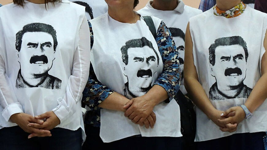 Pro-Kurdish politicians wearing t-shirts featuring Abdullah Ocalan gather to start a hunger strike to demand the right to visit the jailed PKK militant leader Ocalan, in Diyarbakir, Turkey, September 5, 2016. REUTERS/Sertac Kayar - RTX2O6JE