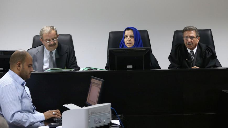 Palestinian judges discuss a petition to suspend municipal elections, at the High Court office in the West Bank city of Ramallah September 8, 2016. REUTERS/Mohamad Torokman   - RTX2ON47