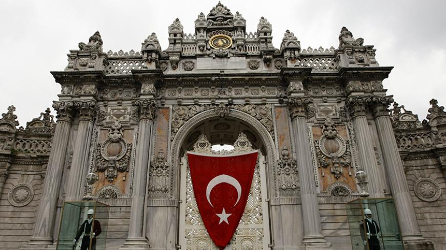 The Ottoman era Dolmabahce Palace is decorated with a huge Turkish flag as part of the National Sovereignty and Children's Day celebrations in Istanbul, April 23, 2009. The National Sovereignty and Children's day marks the 89th anniversary of the opening of the Turkey's National Assembly. REUTERS/Murad Sezer (TURKEY ANNIVERSARY POLITICS) - RTXEAOM