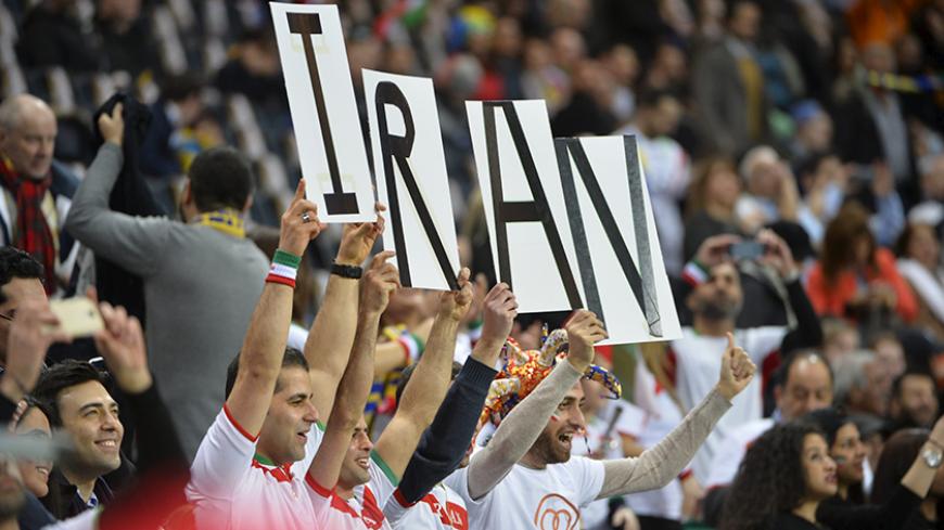 Iran's fans cheer for their team before the international soccer friendly match between Iran and Sweden at Friends Arena in Stockholm March 31, 2015. REUTERS/Henrik Montgomery/TT News Agency
ATTENTION EDITORS - THIS IMAGE WAS PROVIDED BY A THIRD PARTY. THIS PICTURE IS DISTRIBUTED EXACTLY AS RECEIVED BY REUTERS, AS A SERVICE TO CLIENTS. FOR EDITORIAL USE ONLY. NOT FOR SALE FOR MARKETING OR ADVERTISING CAMPAIGNS. SWEDEN OUT. NO COMMERCIAL OR EDITORIAL SALES IN SWEDEN. NO COMMERCIAL SALES. - RTR4VN0A