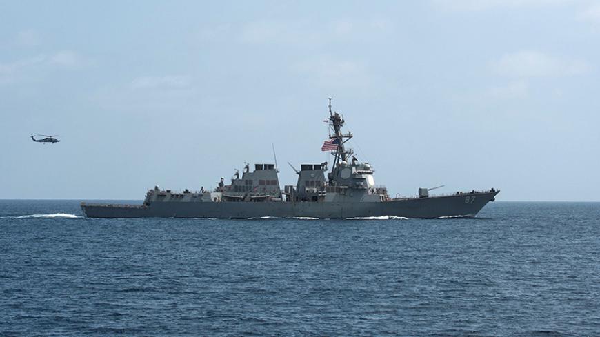 FILE PHOTO - The U.S. Navy guided-missile destroyer USS Mason conducts divisional tactic maneuvers as part of a Commander, Task Force 55, exercise in the Gulf of Oman September 10, 2016.  U.S. Navy/Mass Communication Specialist 1st Class Blake Midnight/Handout via REUTERS/File PhotoTHIS IMAGE HAS BEEN SUPPLIED BY A THIRD PARTY. IT IS DISTRIBUTED, EXACTLY AS RECEIVED BY REUTERS, AS A SERVICE TO CLIENTS. FOR EDITORIAL USE ONLY. NOT FOR SALE FOR MARKETING OR ADVERTISING CAMPAIGNS.     TPX IMAGES OF THE DAY - R