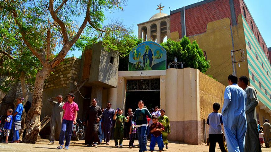 Christians leave after Sunday service at the Al-Galaa Church at Samalout Diocese, in Minya governorate, south of Cairo, May 3, 2015. Copts have long complained of discrimination under successive Egyptian leaders and Sisi's actions suggested he would deliver on promises of being an inclusive president who could unite the country after years of political turmoil. However, striking out at extremists abroad might prove easier than reining in radicals at home. Orthodox Copts, the Middle East's biggest Christian 