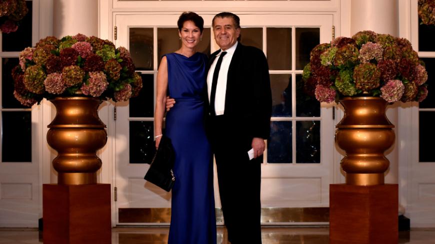 Haim Saban (R) and Cheryl Saban (L) arrive for a State Dinner honoring Italian Prime Minister Matteo Renzi at the White House in Washington October 18, 2016. REUTERS/James Lawler Duggan - RTX2PFE5