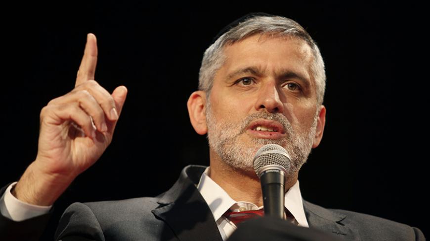 Israeli Interior Minister, Eli Yishai one of the three leaders of the Shas ultra-orthodox Sephardi party gestures during the First High-Tech Conference for Israel's Haredi Sector on January 15, 2013 in Jerusalem. AFP PHOTO/GALI TIBBON        (Photo credit should read GALI TIBBON/AFP/Getty Images)