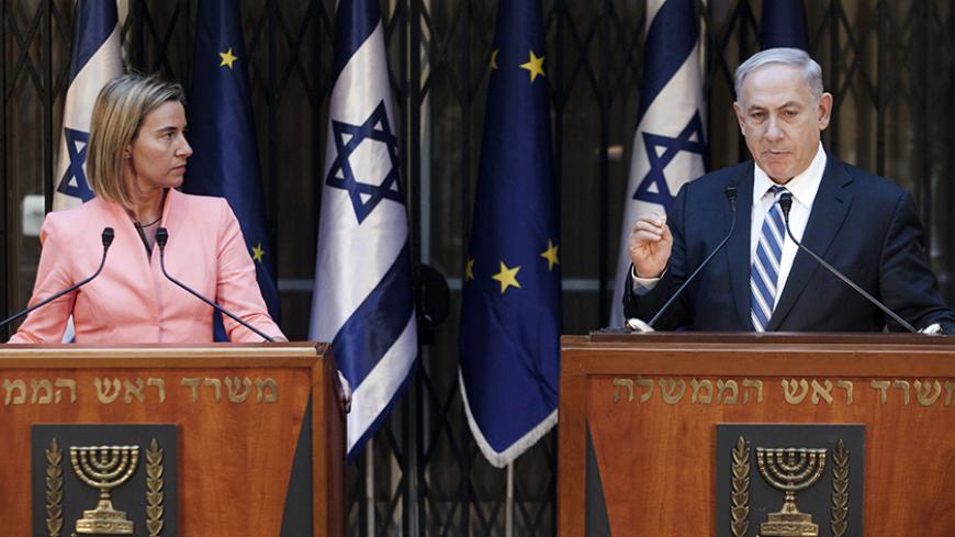 Israeli Prime Minister Benjamin Netanyahu (R) and European Union foreign policy chief Federica Mogherini speak to media following their meeting in Jerusalem, on May 20, 2015. AFP PHOTO / POOL / DAN BALILTY        (Photo credit should read DAN BALILTY/AFP/Getty Images)
