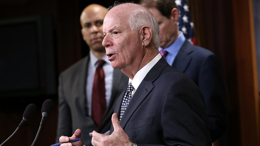 WASHINGTON, DC - OCTOBER 01:  Sen. Ben Cardin (D-MD) speaks during a press conference at the U.S. Capitol introducing the Iran Policy Oversight Act of 2015 October 1, 2015 in Washington, DC. The legislation, if passed, would build on the bipartisan commitment to oversight outlined in the Iran Nuclear Review Act of 2015. Also pictured (L-R) are Sen. Corey Booker (D-NJ) and Sen. Mark Warner (D-VA). (Photo by Win McNamee/Getty Images)