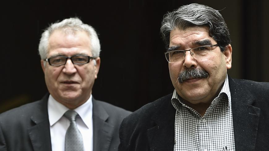 Co-chairman of the Kurdish Syrian Democratic Union Party (PYD), Salih Muslim Muhammad (R) and Kurdish Syrian representative in France Khaled Issa (L) pose prior to a press conference on March 31, 2016 in Paris.       
Washington has been backing Kurdish Syrian fighters of the Democratic Union Party (PYD) as the best force in the fight against IS, but Turkey categorises the PYD as the Syrian branch of the Kurdistan Workers Party (PKK) which has fought a decades-long insurrection against the Turkish state.
 /