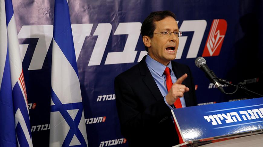 Isaac Herzog leader of Zionist Union, gesture as as he delivers a statement at the party headquarters in Tel Aviv, Israel, May 18, 2016. REUTERS/Baz Ratner - RTSEWFI