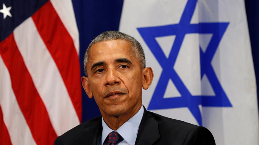U.S. President Barack Obama looks up during his meeting with Israeli Prime Minister Benjamin Netanyahu in New York September 21, 2016. REUTERS/Kevin Lamarque  - RTSOTI2