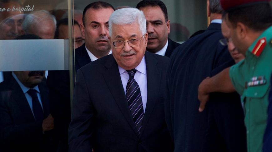 Palestinian President Mahmoud Abbas leaves the hospital in the West Bank city of Ramallah, October 6, 2016. REUTERS/Mohamad Torokman - RTSR22E