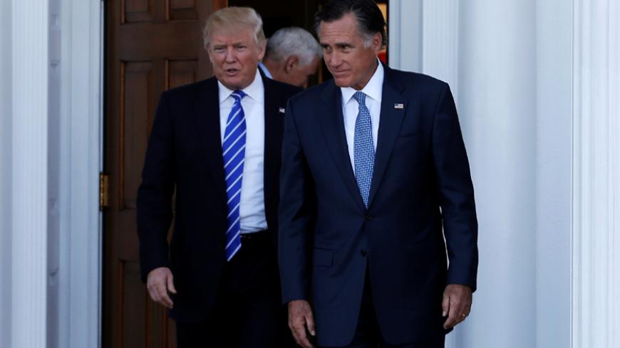 U.S. President-elect Donald Trump (L) and former Massachusetts Governor Mitt Romney emerge after their meeting at the main clubhouse at Trump National Golf Club in Bedminster, New Jersey, U.S., November 19, 2016.  REUTERS/Mike Segar - RTSSFB6