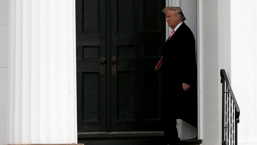 U.S. President-elect Donald Trump exits the Lamington Presbyterian Church after attending Sunday services in Bedminster, New Jersey, U.S., November 20, 2016.  REUTERS/Mike Segar - RTSSI1I