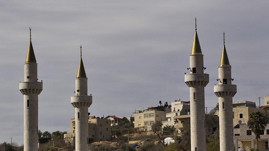 The four minarets of a new mosque are seen in the Israeli-Arab village of Abu Ghosh, near Jerusalem November 22, 2013.In a Holy Land rich with religious sites, the new Abu Ghosh mosque is rare - as is the hilly village from which it rises. Bankrolled largely by Chechnya and named after its former leader Akhmad Kadyrov, who was slain by Islamist militants in 2004, the glimmering shrine tells of this small Israeli Arab community's historical ties to the restive Russian province. Picture taken November 22, 201