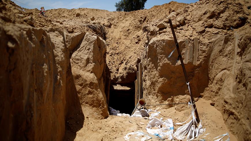 An entrance to a tunnel which Israel's military said it had discovered is seen just outside the southern Gaza Strip May 6, 2016. REUTERS/ Amir Cohen  - RTX2D427