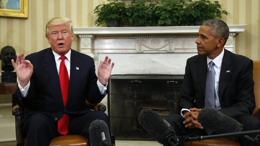 U.S.  President Barack Obama (R) meets with President-elect Donald Trump to discuss transition plans in the White House Oval Office in Washington, U.S., November 10, 2016.  REUTERS/Kevin Lamarque  - RTX2T2JJ