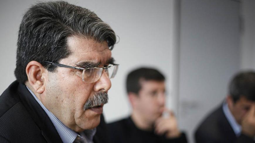 Saleh Muslim, head of the Kurdish Democratic Union Party (PYD), is seen during a Reuters interview in Berlin April 18, 2013.  Bombings of Kurdish areas in Syria suggest that Syrian Kurds, long detached from the revolt against President Bashar al-Assad, are increasingly being targeted by his forces after they struck deals with rebels fighting to topple him, Muslim said. To match Interview SYRIA-CRISIS/KURDS REUTERS/Wolfgang Rattay (GERMANY - Tags: POLITICS CIVIL UNREST PROFILE) - RTXYR77