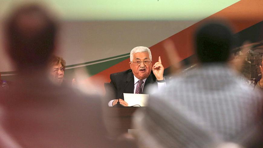 Palestinian President Mahmoud Abbas gestures as he speaks during Fatah congress in the West Bank city of Ramallah November 30, 2016. REUTERS/Mohamad Torokman - RTSU1Z3