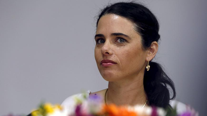 Ayelet Shaked, Israel's new Justice Minister of the far-right Jewish Home party, attends a ceremony at the Justice Ministry in Jerusalem May 17, 2015. REUTERS/Gali Tibbon/Pool/File Photo - RTX2RPZJ