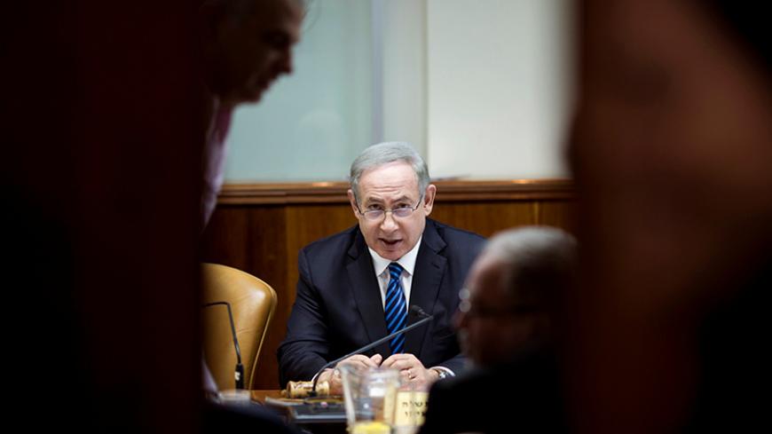 Israeli Prime Minister Benjamin Netanyahu attends the weekly cabinet meeting at his office in Jerusalem December 11, 2016. REUTERS/Abir Sultan/Pool - RTX2UHUE