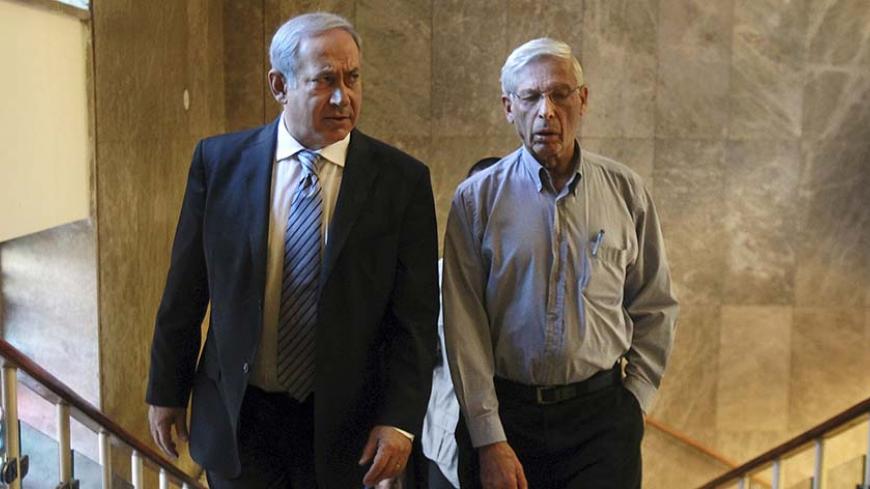 Israel's Prime Minister Benjamin Netanyahu (L) and Benny Begin, the son of the late Prime Minister Menahem Begin and a member of Netanyahu's cabinet, arrive to the weekly cabinet meeting in Jerusalem October 31, 2010. Netanyahu will travel to New Orleans early in November for an annual U.S. Jewish conference, but is unlikely to meet President Barack Obama, who will be in Asia. REUTERS/Jim Hollander/Pool (JERUSALEM - Tags: POLITICS) - RTXU1NU