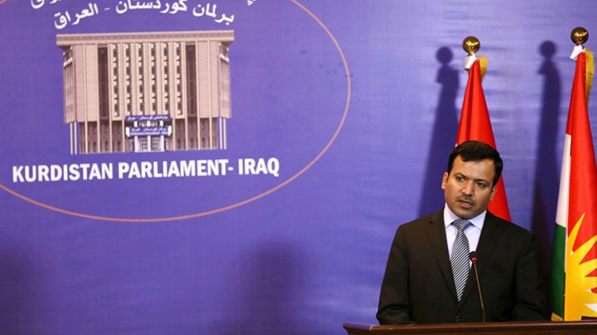 The speaker of the Parliament of Iraq's autonomous Kurdish region, Yossef Mohammed speaks during a joint press conference with Kurdistan's Prime Minister (unseen) about oil agreements on May 14, 2015 in Arbil, the capital of the autonomous Kurdish region of northern Iraq.  AFP PHOTO / SAFIN HAMED        (Photo credit should read SAFIN HAMED/AFP/Getty Images)