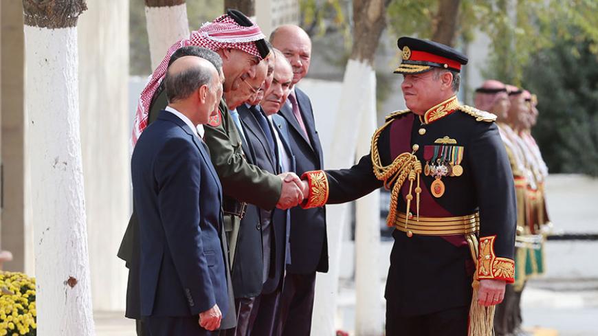 AMMAN, JORDAN- NOVEMBER 7: Jordan's King Abdullah II is welcomed by the chairman of the joint chiefs staff Mahmoud Freihat, upon his arrival for the State opening of the Parliament on November 7, 2016, in Amman, Jordan. King Abdullah addressed the recently elected 18th Jordanian Lower House of Parliament with the appointed Higher House of the Senate with the attendence of royal family members and the government. ( Photo by Jordan Pix/ Getty Images)
