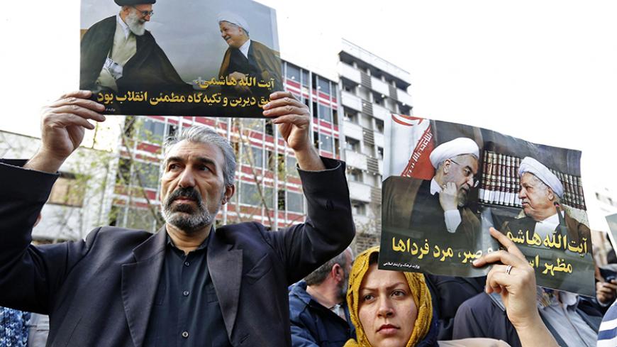 Iranians hold posters of late former Iranian President Akbar Hashemi Rafsanjani during his funeral ceremony in the capital Tehran, on January 10, 2017.
The heavyweight politician, who died on January 8 at the age of 82, will be buried inside the crypt of Ayatollah Ruhollah Khomeini, the leader of Iran's 1979 Islamic revolution, at Khomeini's mausoleum is in south Tehran.


 / AFP / ATTA KENARE        (Photo credit should read ATTA KENARE/AFP/Getty Images)
