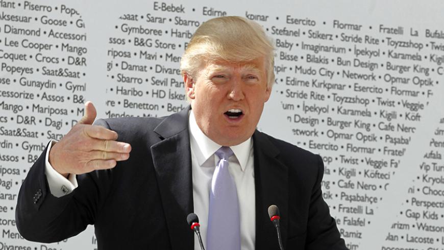 Donald Trump speaks during a news conference during the opening of the Trump Towers Mall in Istanbul April 20, 2012.  REUTERS/Osman Orsal (TURKEY - Tags: BUSINESS REAL ESTATE) - RTR30Z7A