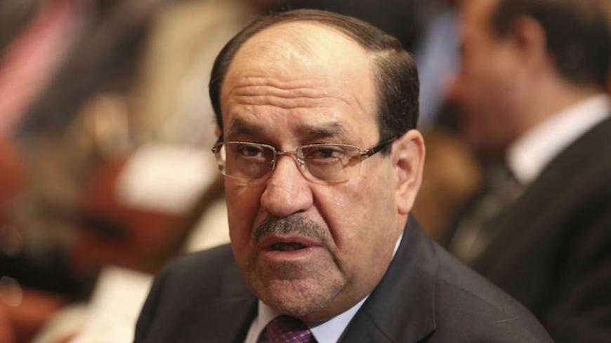 Iraq's Vice President Nouri al-Maliki attends a parliament session in Baghdad September 8, 2014. Iraq's parliament approved a new government headed by Haider al-Abadi as prime minister on Monday night, in a bid to rescue Iraq from collapse, with sectarianism and Arab-Kurdish tensions on the rise. REUTERS/Hadi Mizban/Pool (IRAQ - Tags: POLITICS) - RTR45G3J