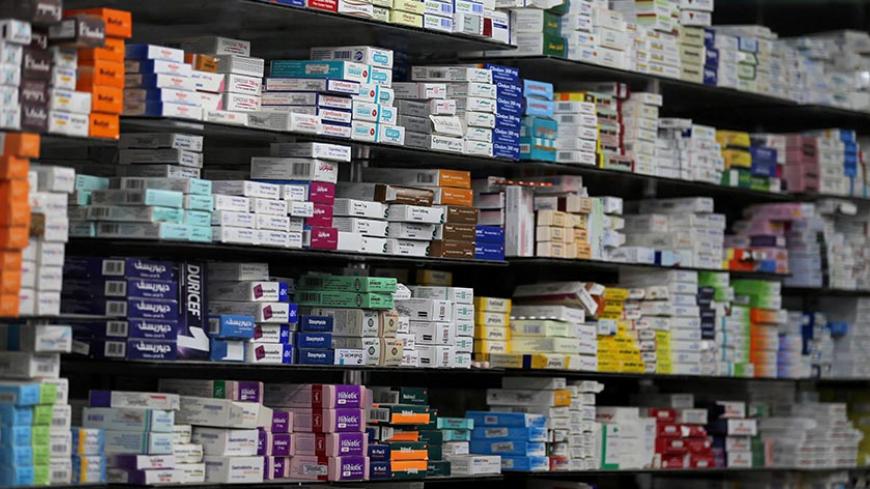 Medicine are arranged on a shelf inside in a pharmacy in Cairo, Egypt, November 17, 2016. Picture taken November 17, 2016. REUTERS/Mohamed Abd El Ghany  To match Insight EGYPT-CURRENCY/MEDICINE - RTSSSE9