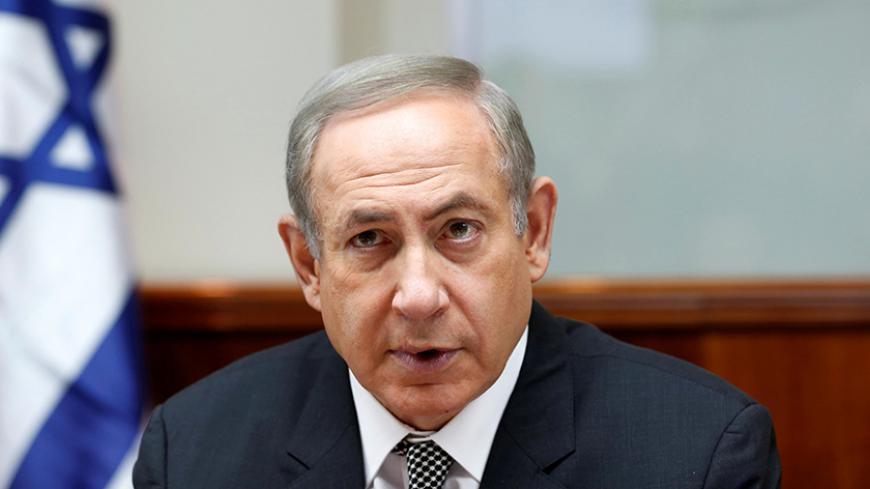 Israeli Prime Minister Benjamin Netanyahu attends the weekly cabinet meeting in Jerusalem January 15, 2017. REUTERS/Ronen Zvulun - RTSVKXN