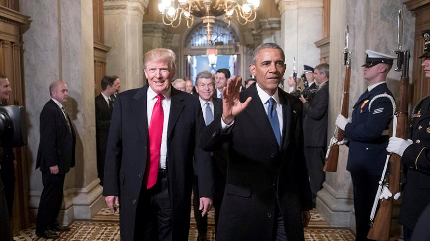 President-elect Donald Trump, left, and President Barack Obama arrive for Trump's inauguration ceremony at the Capitol in Washington, D.C., U.S. January 20, 2017. REUTERS/J. Scott Applewhite/Pool     TPX IMAGES OF THE DAY - RTSWLA4