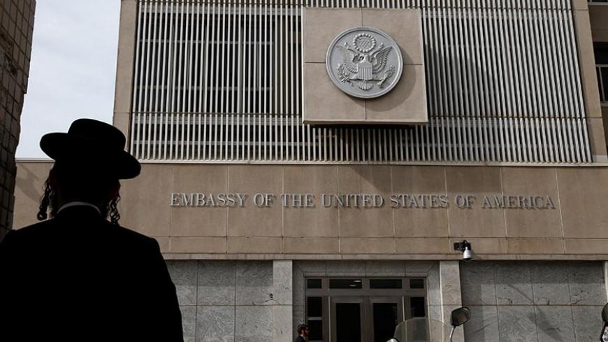 An ultra-Orthodox Jewish man stands in front of the U.S Embassy in Tel Aviv, Israel January 24, 2017. REUTERS/Baz Ratner - RTSX3UD