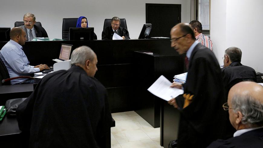 Palestinian judges discuss a petition to suspend municipal elections, at the High Court office in the West Bank city of Ramallah September 8, 2016. REUTERS/Mohamad Torokman   - RTX2OMZF