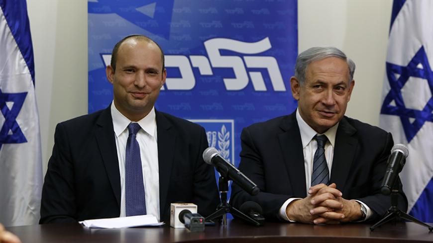 Israeli Prime Minister Benjamin Netanyahu (R) and the head of the right-wing Jewish Home party, Naftali Bennett give a press conference at the Knesset in Jerusalem, on May 6, 2015, to announce the formation of a coalition government. Just ahead of the midnight deadline, Netanyahu managed to put together a narrow majority coalition, comprising his rightwing Likud party with centre-right Kulanu, far-right national-religious Jewish Home and two ultra-Orthodox parties, United Torah Judaism (UTJ) and Shas.      