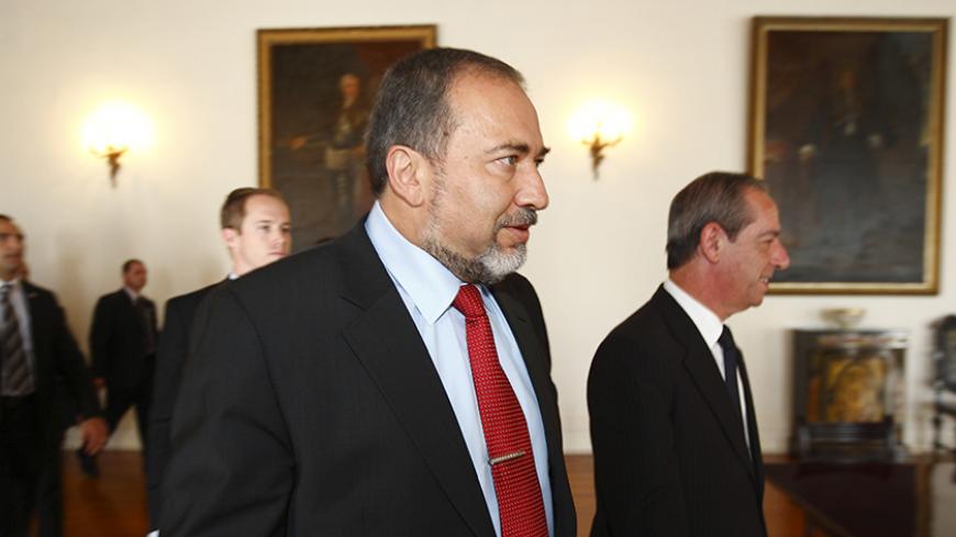 Israeli Foreign Minister Avigdor Liberman (C) walks with Malta's Prime Minister Lawrence Gonzi (R) at the prime minister's office at Auberge de Castille in Valletta June 24, 2010.  
REUTERS/Darrin Zammit Lupi (MALTA - Tags: POLITICS) MALTA OUT. NO COMMERCIAL OR EDITORIAL SALES IN MALTA - RTR2FNQR