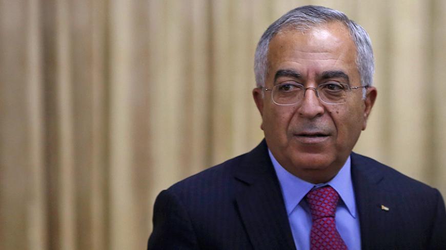 Palestinian Prime Minister Salam Fayyad attends an opening reception of Conference on Cooperation among East Asian Countries for Palestinian Delevopment (CEAPAD) in Tokyo February 13, 2013. Japan co-hosted the CEAPAD with Palestine in Tokyo on Wednesday as a part of efforts toward achieving the Middle East peace, according to the government statement.  REUTERS/Issei Kato (JAPAN - Tags: POLITICS) - RTR3DQ69