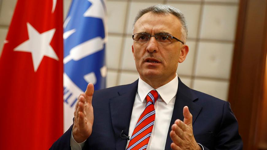 Turkey's Finance Minister Naci Agbal speaks during an interview with Reuters in Ankara, Turkey, September 27, 2016. Picture taken September 27, 2016. REUTERS/Umit Bektas - RTSPSH4