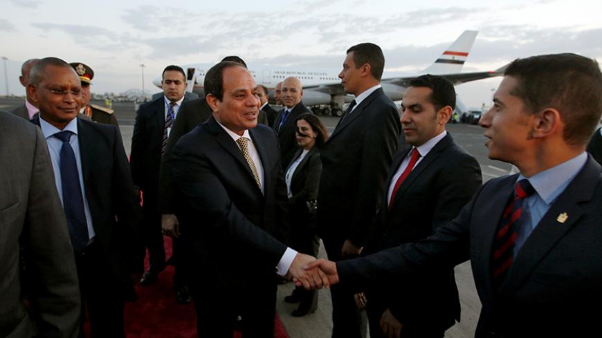 Egypt's President Abdel Fattah al-Sisi is received on his arrival at the Bole International Airport ahead of the 28th Ordinary Session of the Assembly of the Heads of State and the Government of the African Union in Ethiopia's capital Addis Ababa, January 29, 2017. REUTERS/Tiksa Negeri - RTSXXIE