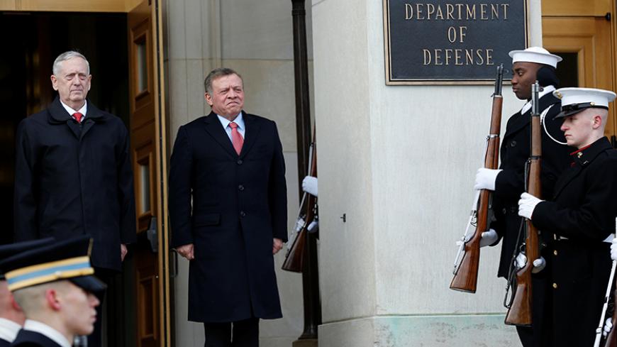 U.S. Defense Secretary James Mattis (L) welcomes Jordan King Abdullah at the Pentagon in Washington, U.S., January 30, 2017. REUTERS/Yuri Gripas - RTSY39K
