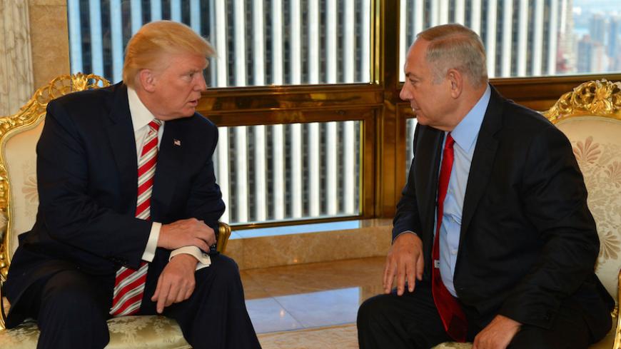 Israeli Prime Minister Benjamin Netanyahu (R) speaks to Republican U.S. presidential candidate Donald Trump during their meeting in New York, September 25, 2016. Kobi Gideon/Government Press Office (GPO)/Handout via REUTERS       ATTENTION EDITORS - THIS IMAGE HAS BEEN SUPPLIED BY A THIRD PARTY. FOR EDITORIAL USE ONLY. - RTX2SIOS