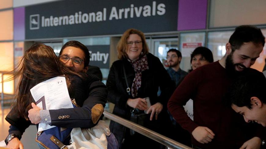 Behnam Partopour, a Worcester Polytechnic Institute (WPI) student from Iran, is greeted by his sister Bahar (L) at Logan Airport after he cleared U.S. customs and immigration on an F1 student visa in Boston, Massachusetts, U.S. February 3, 2017.  Partopour was originally turned away from a flight to the U.S. following U.S. President Donald Trump's executive order travel ban.   REUTERS/Brian Snyder     TPX IMAGES OF THE DAY - RTX2ZKDO