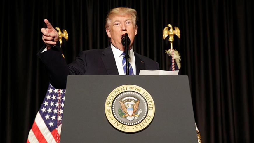 U.S. President Donald Trump speaks to members of the law enforcement at the Major Cities Chiefs Association (MCCA) Winter Conference in Washington, U.S., February 8, 2017.      REUTERS/Joshua Roberts - RTX305LF