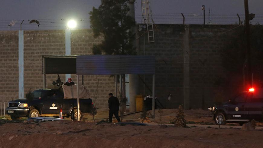 A general view shows security forces in front of Swaqa prison near Amman February 4, 2015. Jordan hanged two Iraqis on Wednesday, including female militant Sajida al-Rishawi, hours after Islamic State released a video appearing to show captured Jordanian pilot Muath al-Kasaesbeh being burnt alive, a security source and state television said. Rishawi and fellow prisoner Ziyad Karboli were executed in Swaqa prison, a large facility 70 km (45 miles) south of the capital, Amman, just before dawn, a security sou