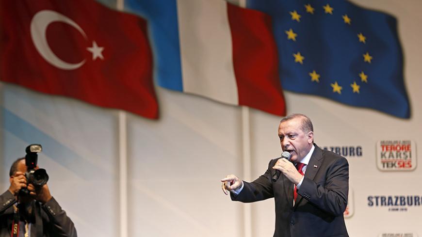 Turkey's President Recep Tayyip Erdogan delivers a speech during a rally against terrorism in Strasbourg, France, October 4, 2015. Some 30000 supporters coming from several countries including France, Germany, and Switzerland gathered in Strasbourg on Sunday to listen to Turkish President Erdogan's address. REUTERS/Vincent Kessler   - RTS2Z0D