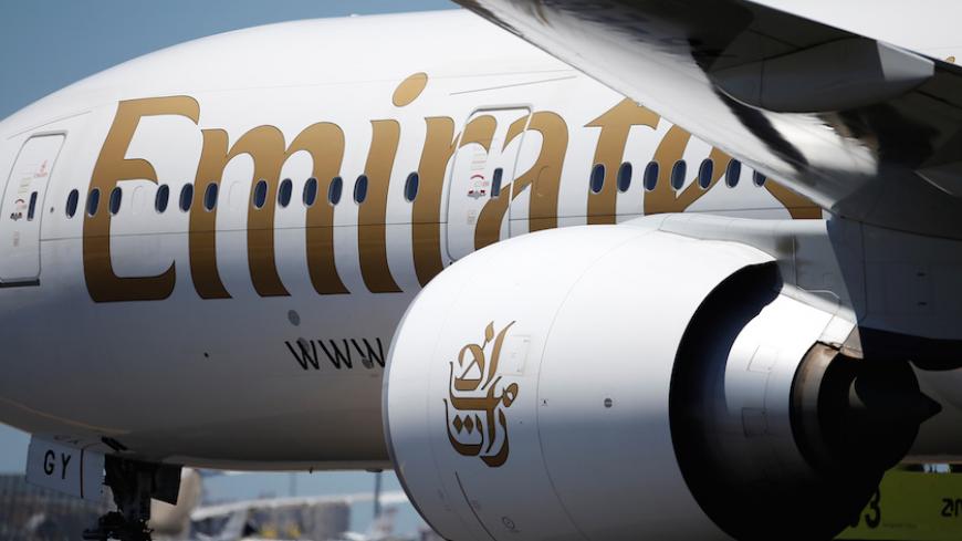 An Emirates plane is seen at Lisbon's airport, Portugal June 24, 2016. REUTERS/Rafael Marchante - RTSHVQ6