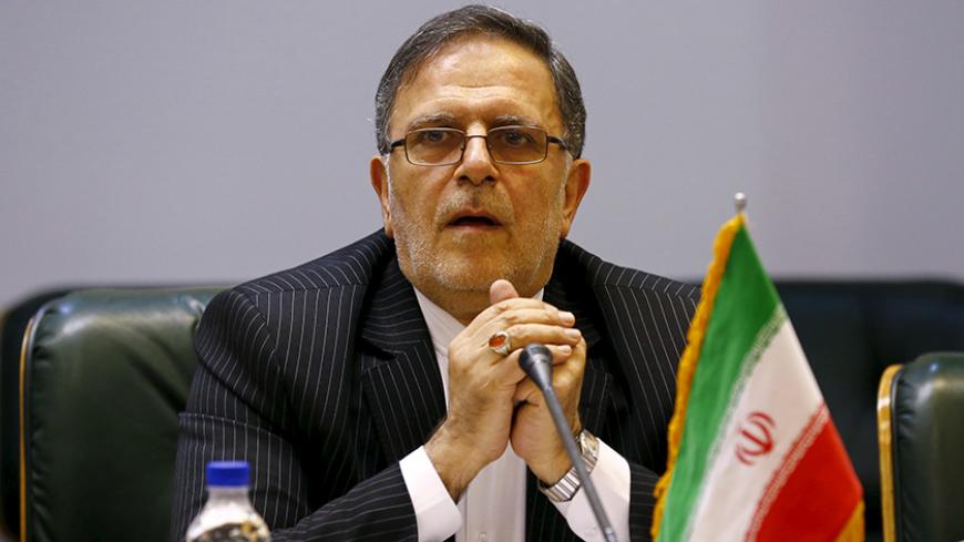 Valiollah Seif, Governor of Central Bank of Iran, waits to start a meeting with Britain's Foreign Secretary Philip Hammond (unseen) in Tehran, Iran August 23, 2015.  REUTERS/Darren Staples - RTX1PBAT