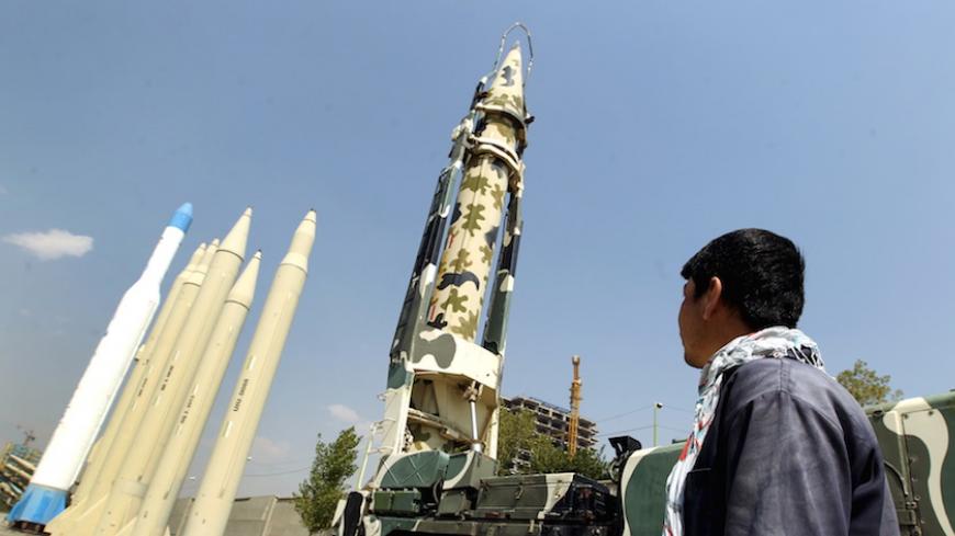A man looks at Iranian-made missiles at Holy Defence Museum in Tehran September 23, 2015.REUTERS/Raheb Homavandi/TIMAATTENTION EDITORS - THIS PICTURE WAS PROVIDED BY A THIRD PARTY. REUTERS IS UNABLE TO INDEPENDENTLY VERIFY THE AUTHENTICITY, CONTENT, LOCATION OR DATE OF THIS IMAGE. FOR EDITORIAL USE ONLY. NOT FOR SALE FOR MARKETING OR ADVERTISING CAMPAIGNS. NO THIRD PARTY SALES. NOT FOR USE BY REUTERS THIRD PARTY DISTRIBUTORS. THIS PICTURE IS DISTRIBUTED EXACTLY AS RECEIVED BY REUTERS, AS A SERVICE TO CLIENT